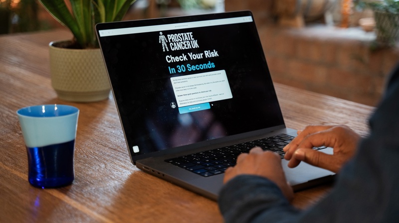 Mens Health Week Risk Checker On Laptop