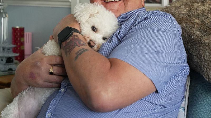 Impact story man and dog