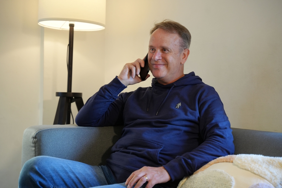 Andy speaking on the phone.