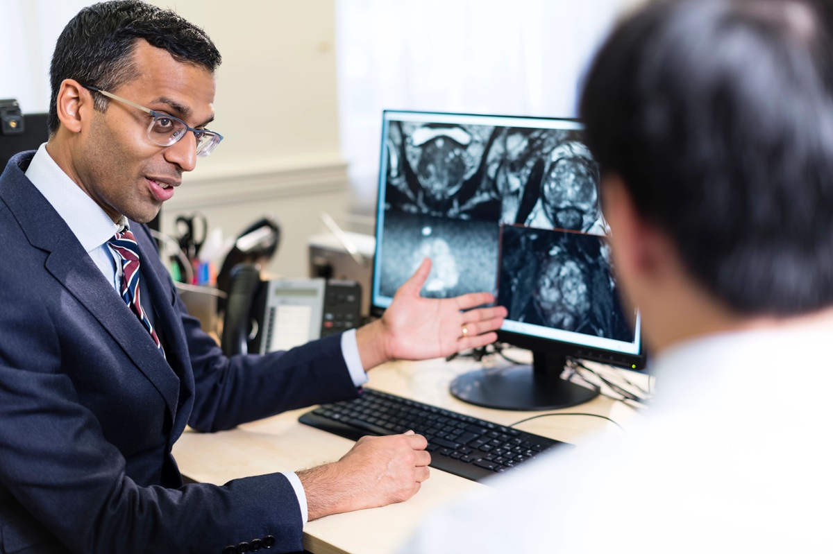 Doctor And Patient looking at scan results