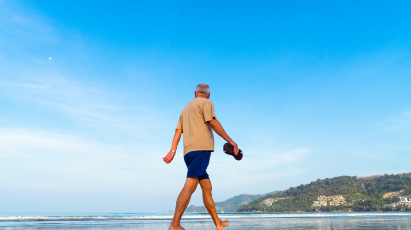 Man walking on beach